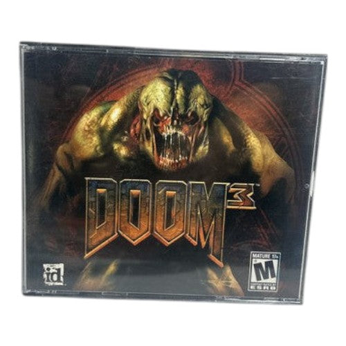 DOOM 3 game case with a creature on the cover