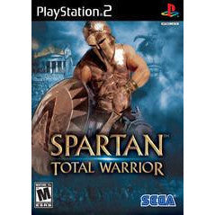 PlayStation 2 game cover for 'Spartan Total Warrior' featuring a Spartan warrior.
