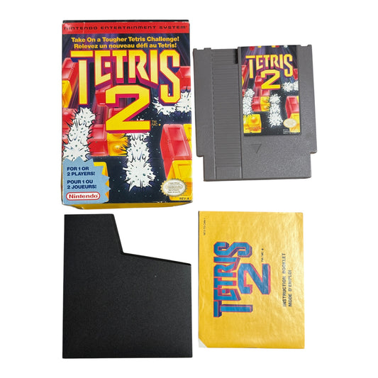 Nintendo Entertainment System game cartridge and packaging for 'Tetris 2' on a white background
