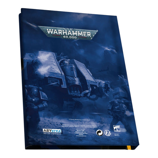 Warhammer 40,000 game book with a futuristic vehicle design on the cover.