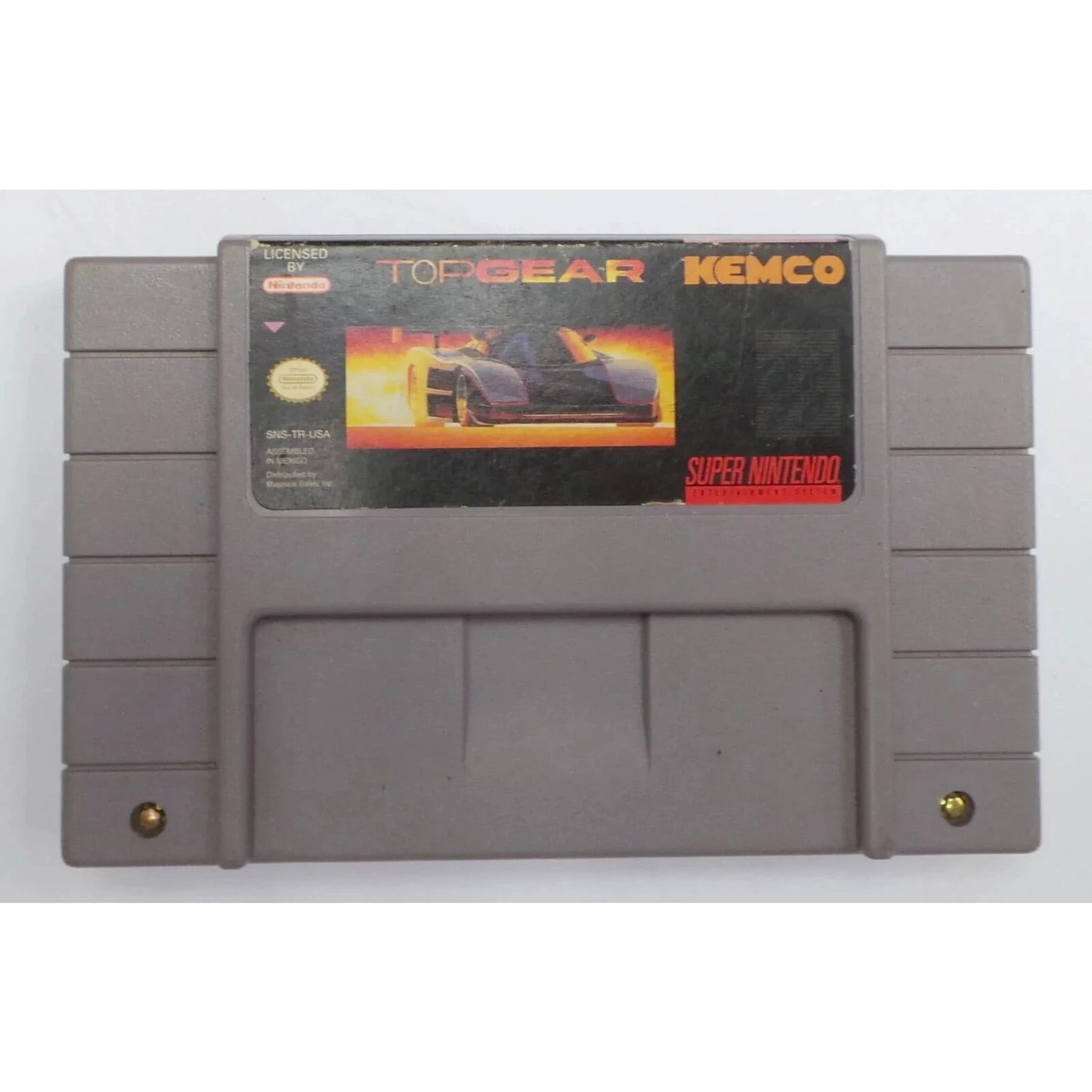 Super Nintendo game cartridge with 'Top Gear' and 'Kemco' branding on a white background