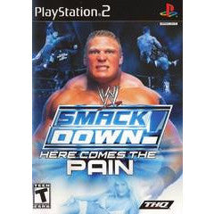 PlayStation 2 game cover for 'SmackDown! Here Comes the Pain' featuring a wrestler.
