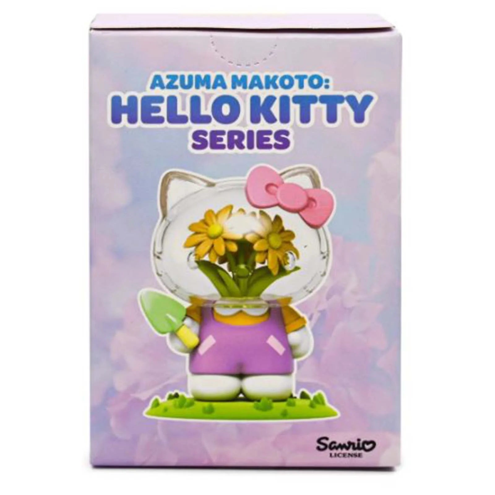 Boxed figurine of Hello Kitty with flowers on a pastel background