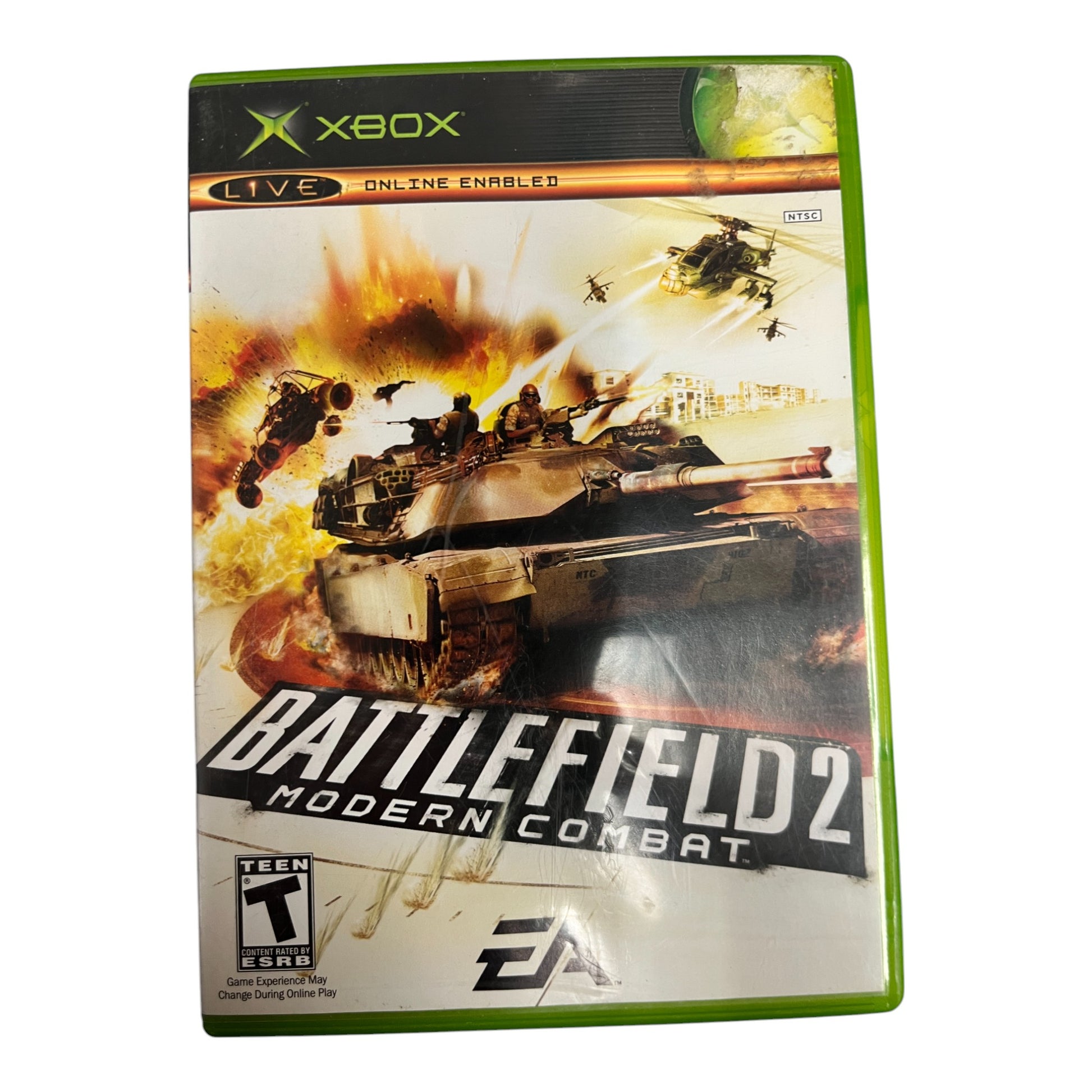 Xbox game case for 'Battlefield 2: Modern Combat' with tank and soldier graphics.