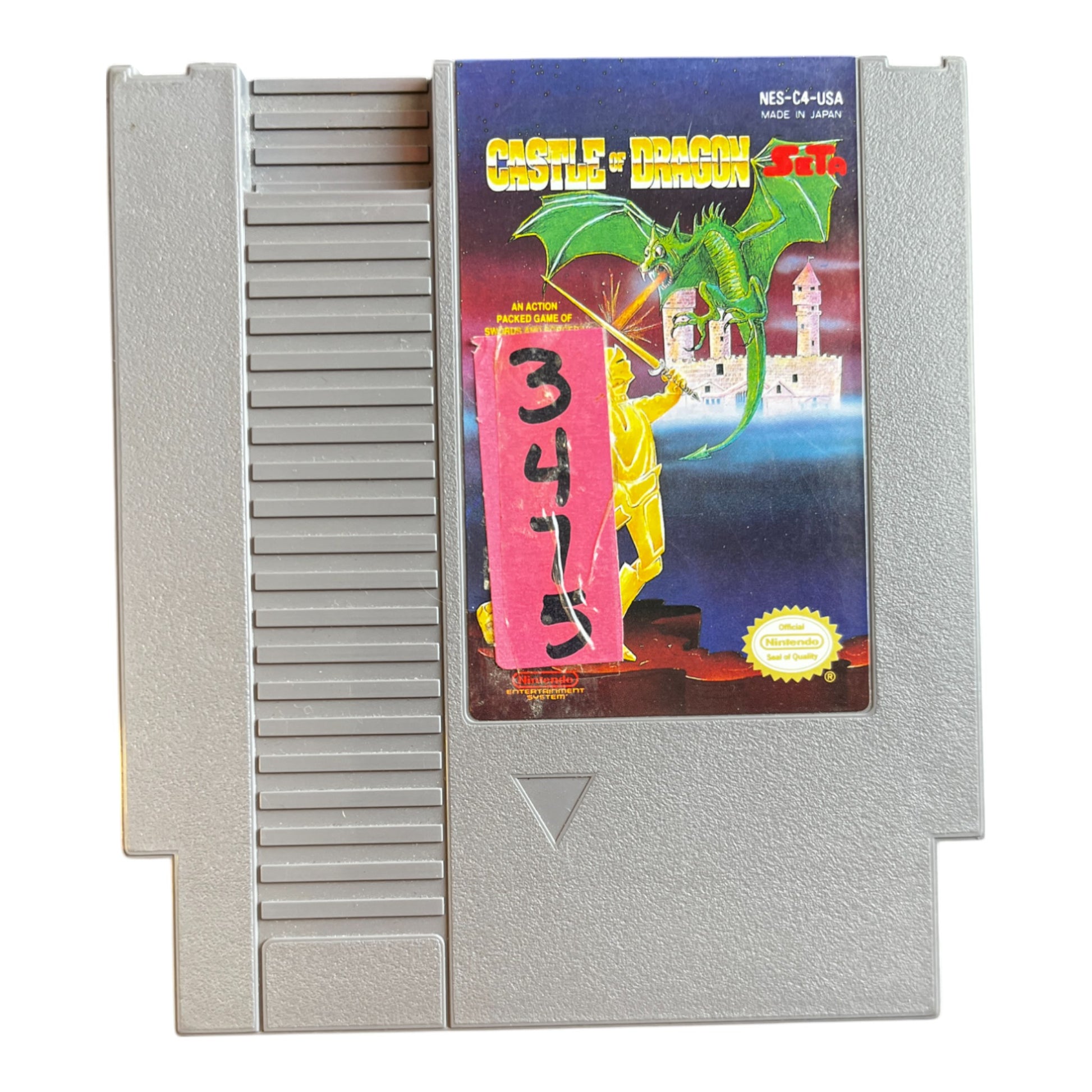NES game cartridge with colorful packaging featuring a dragon and castle design.