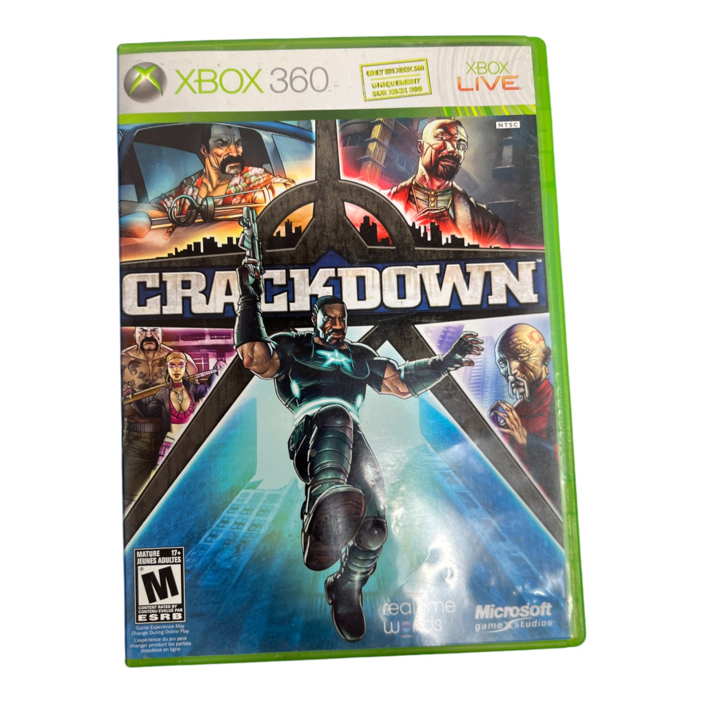 Game case for 'Crackdown' on Xbox 360 with character and cityscape graphics.