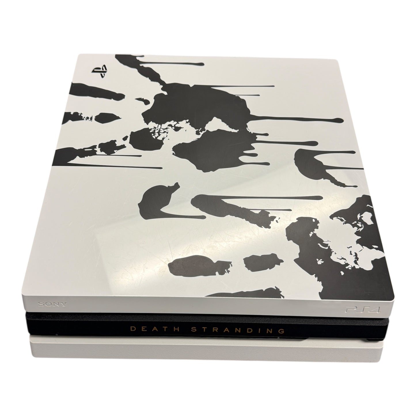 PlayStation 4 console with 'Death Stranding' design on a white background