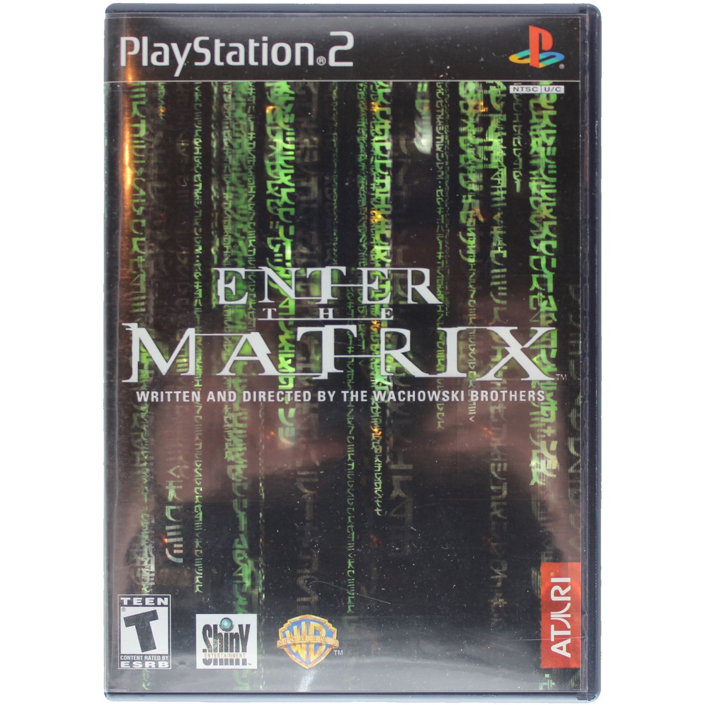 PlayStation 2 game case for 'Enter the Matrix' with branding and rating visible.