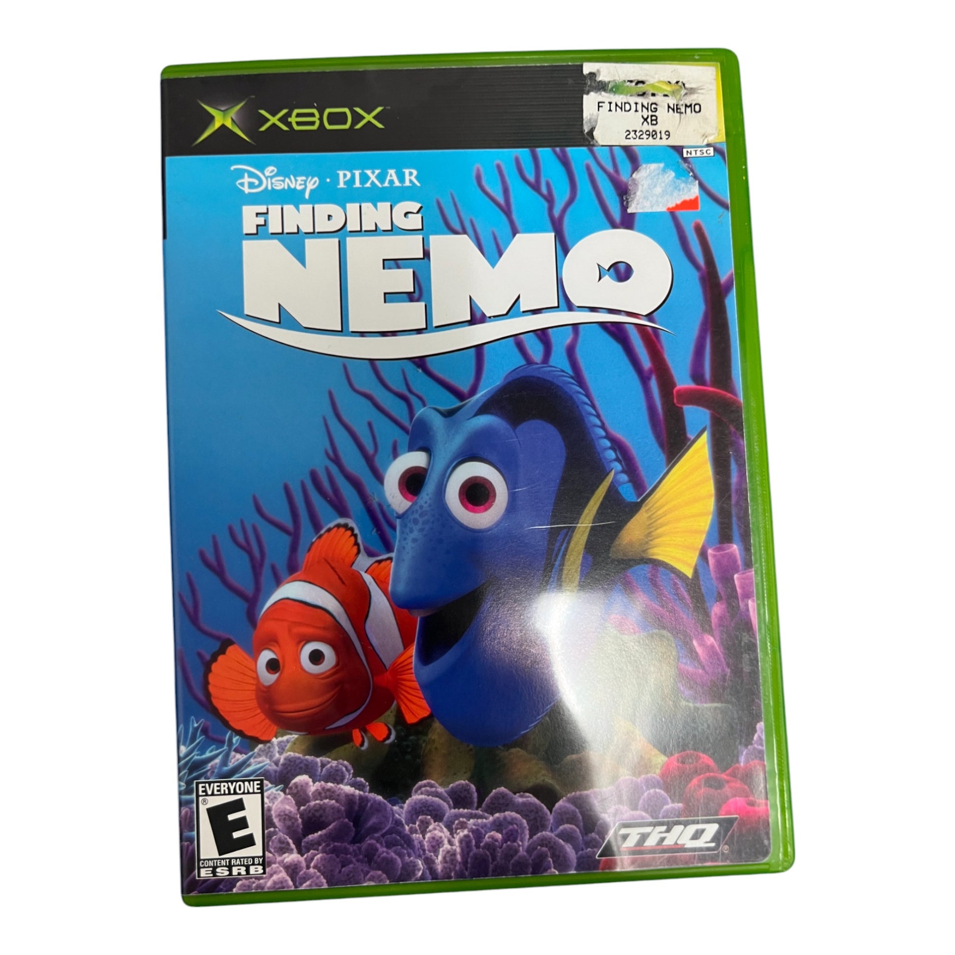 Xbox game cover for 'Finding Nemo' with cartoon fish characters on a blue background.