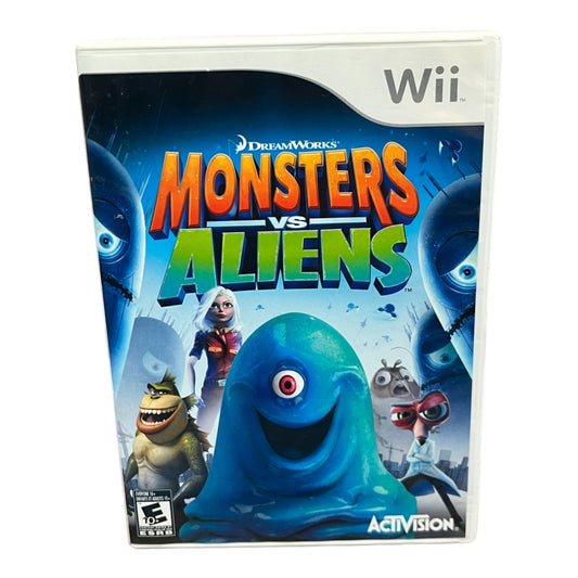 Wii game console cover for 'Monsters vs Aliens' with colorful text and character images.