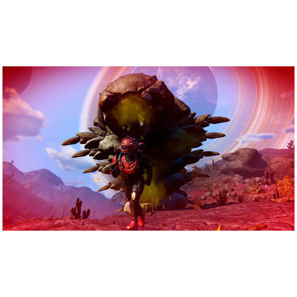 Character in futuristic armor standing next to a large alien plant-like creature on a colorful alien landscape.