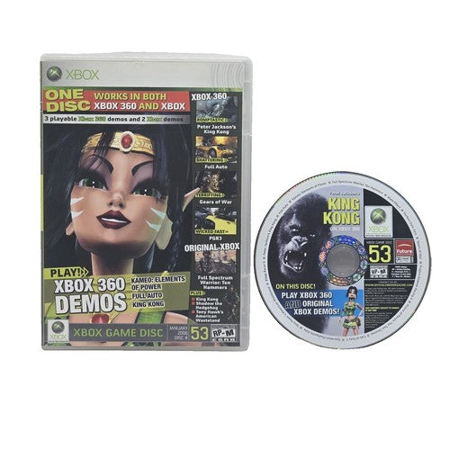 Xbox game disc with Wonder Woman packaging and King Kong disc on a white background