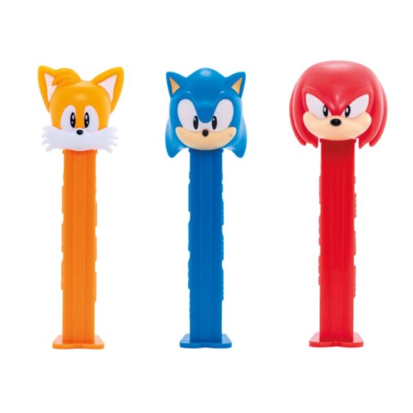 Three PEZ dispensers shaped like characters with orange, blue, and red colors on a white background.