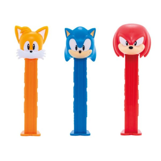 Three PEZ dispensers shaped like characters with orange, blue, and red colors on a white background.