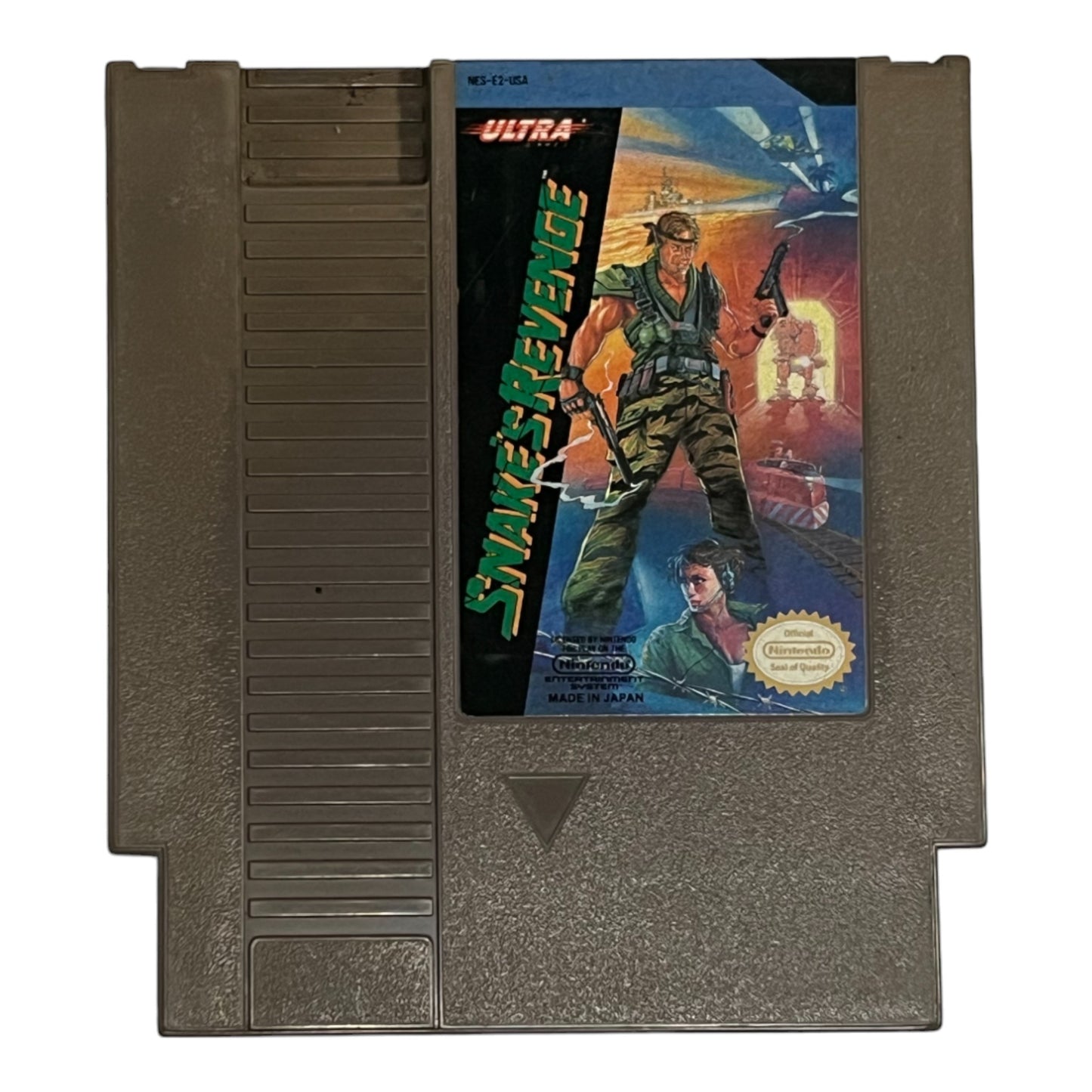 Vintage video game cartridge with 'Snakes Revenge' cover art on a white background