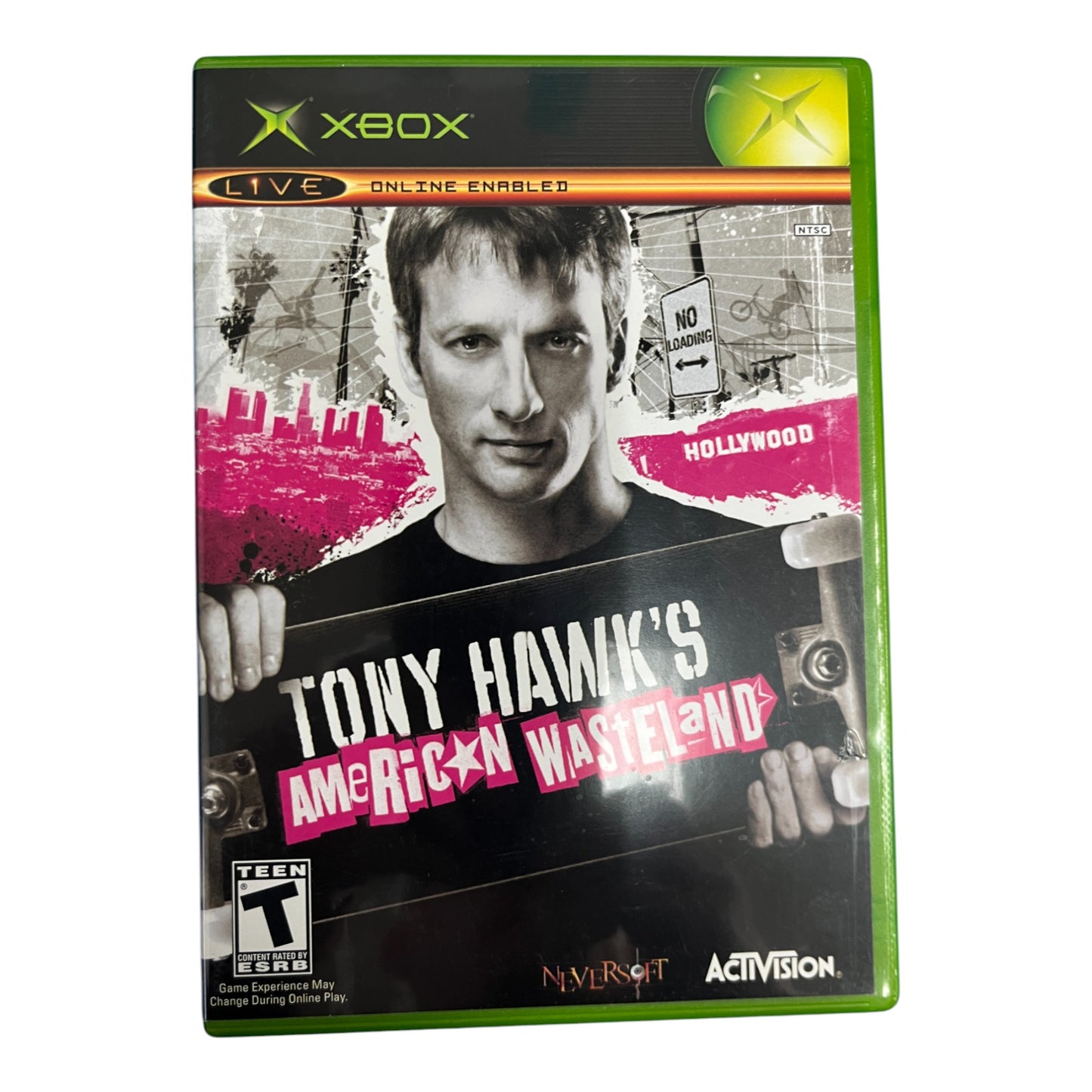 Xbox game cover for 'Tony Hawk's American Wasteland' featuring a person holding a skateboard.