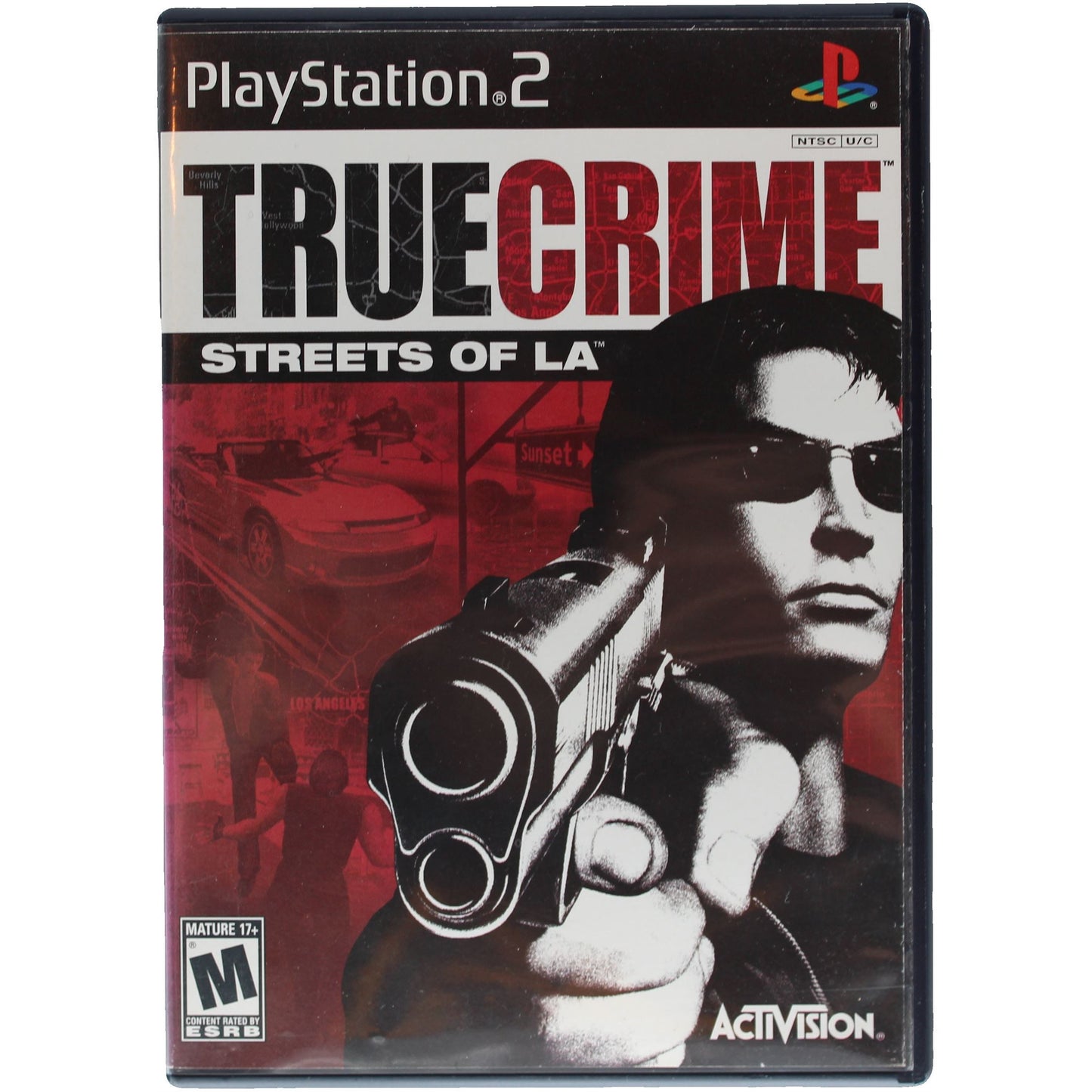 PlayStation 2 game case for 'True Crime: Streets of LA' with a gun and cityscape background.