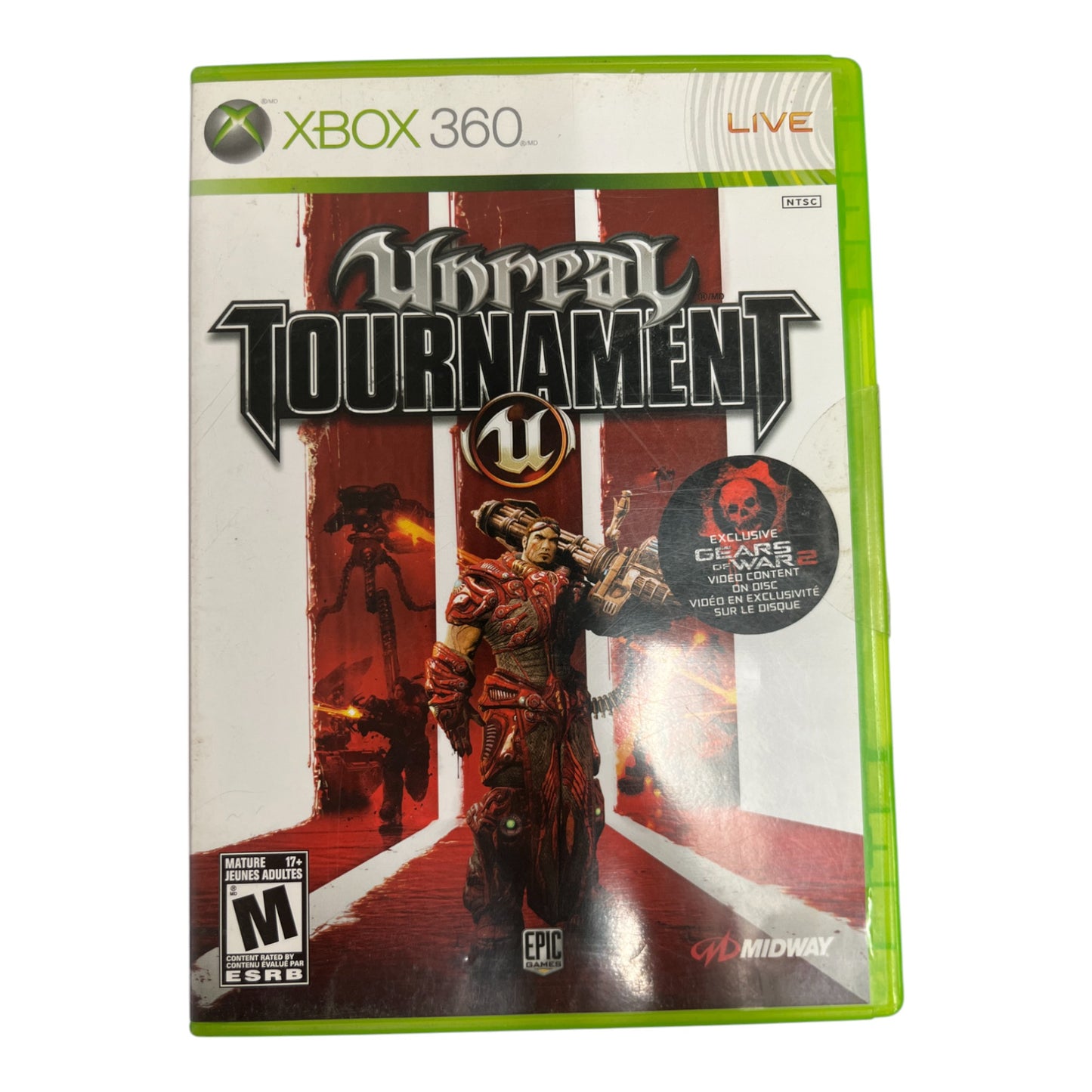 Xbox 360 game case titled ' Unreal Tournament' with character illustration on a white background.