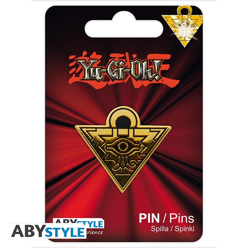 Yu-Gi-Oh! pin packaging with gold triangle design on red background
