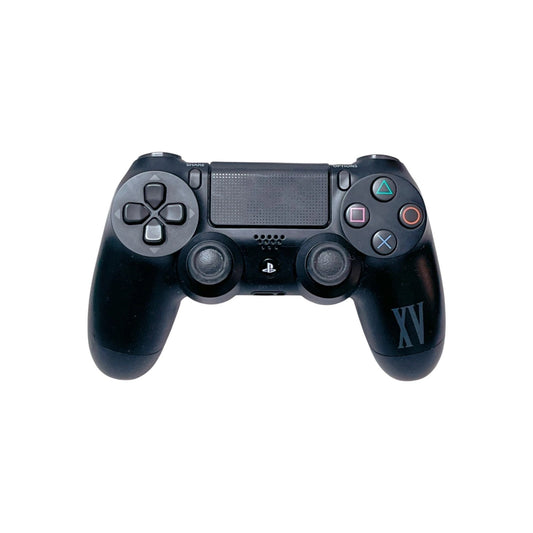 Black gaming controller on a white background