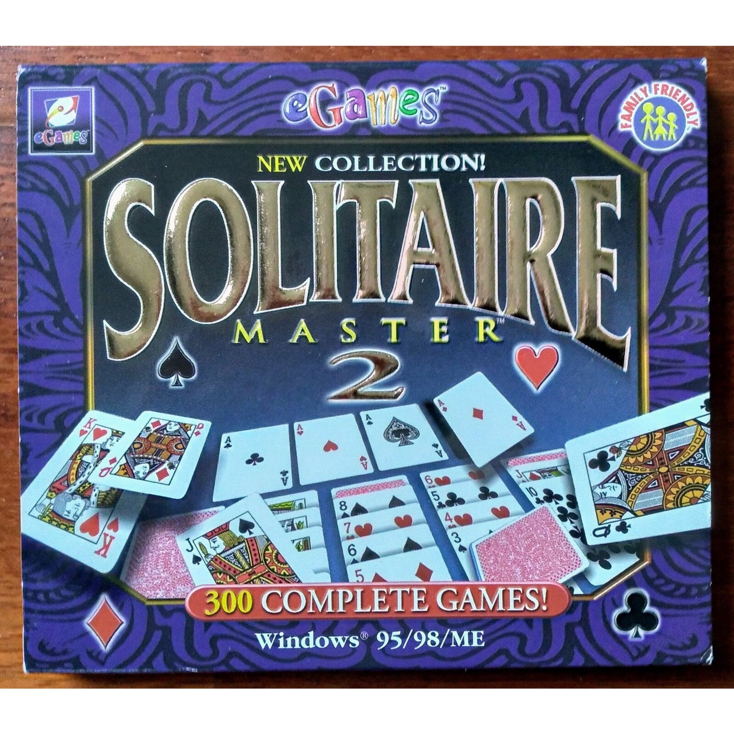 Box of Solitaire Master 2 game with playing cards on a purple background