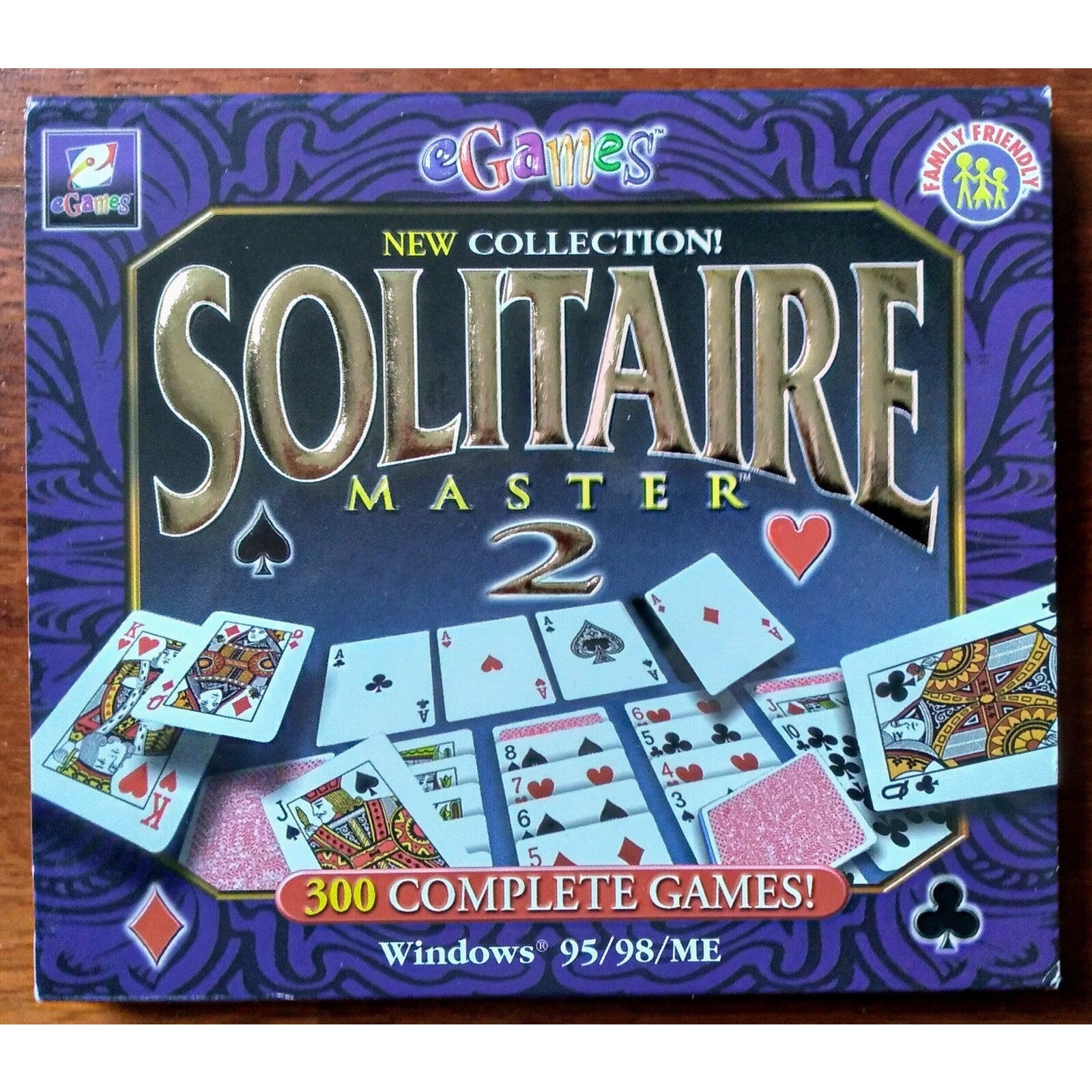 Box of Solitaire Master 2 game with playing cards on a purple background