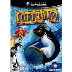 GameCube game cover for 'Surf's Up' with penguins and a shark against a blue wave background.